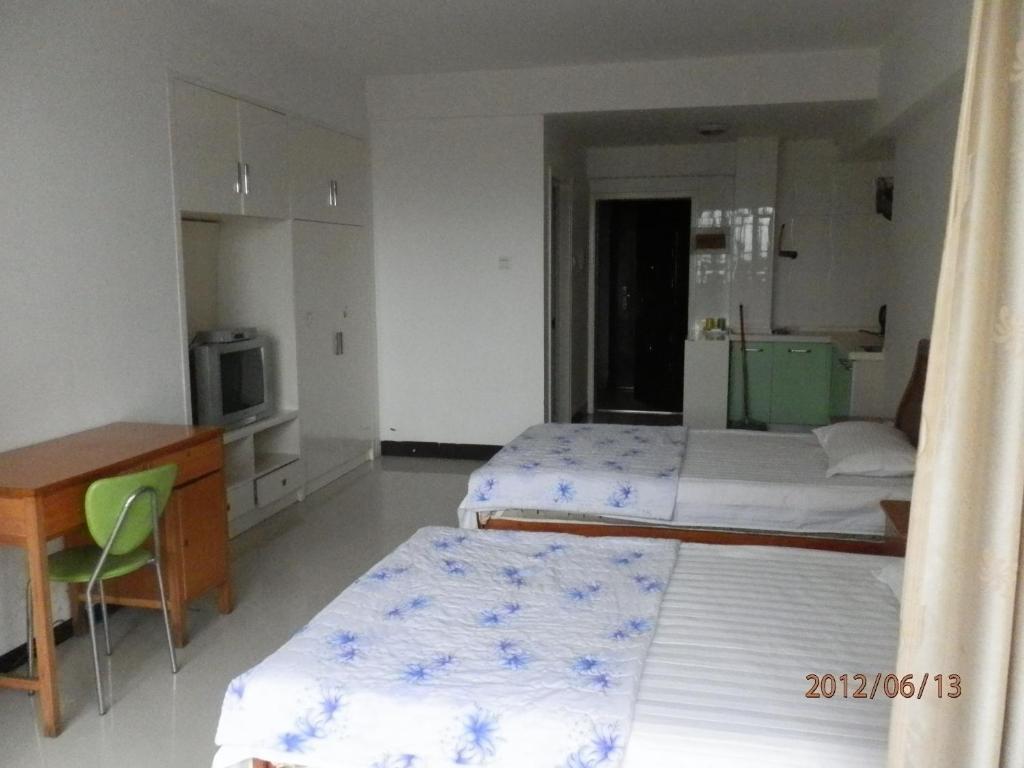 Xingfu Hotel ناننينغ الغرفة الصورة